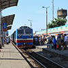 Passengers preparing to catch a diesel engine train at Vinh railway station