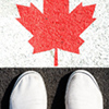 Sneakers and the canada flag. view from above. travels.