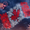 colorful holiday fireworks with national flag of Canada, evening sky with majestic clouds