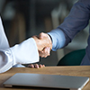 cropped image of handshake - business attire