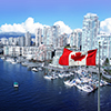 Canadian flag in front of view of false creek and the burrard street bridge in vancouver, canada.