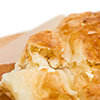Placinta cake filled with a soft cheese as a romanian cuisine. Can be used as a whole background.