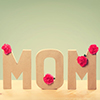 3D MOM Text with Fresh Carnation Flowers Standing on the Wooden Table with Light Green Background