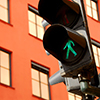 walking sign traffic light in green at city