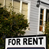 For Rent sign in front of house