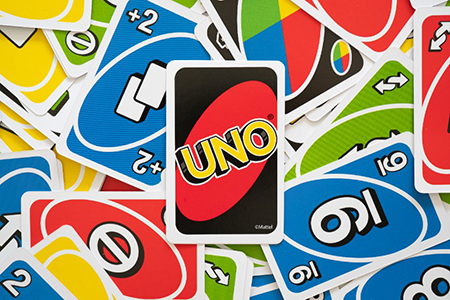6 april 2019, wuhan china : uno game cards scattered all over the frame and one card showing the rev