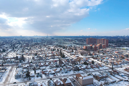 Aerial bird eye view skyline at Winter season in Canada. Hundreds of low rise houses from top view i