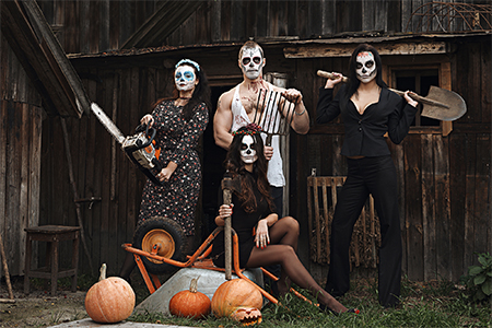 Group of people with sugar skull makeup outdoor