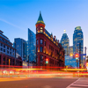 The famous Gooderham building and the skyscrapers in the background