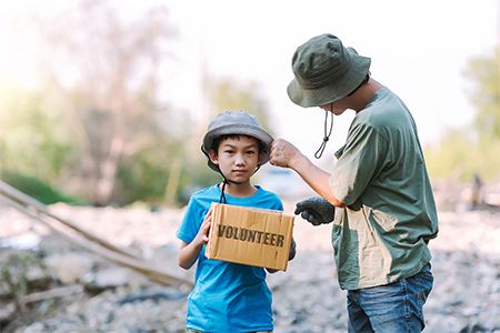 Teamwork of asian family environment conservation volunteer help to picking plastic and foam garbage