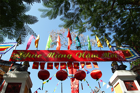 Festive colorful decorations on a building for celebrating Tet - Vietnamese New Year