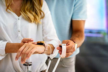 young people buying new watch
