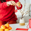  Woman decorated house for Chinese New Year Celebrations