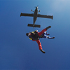 Freeflying skydivers in blue sky