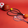 Sport equipment flat lay; Variety of rackets and balls