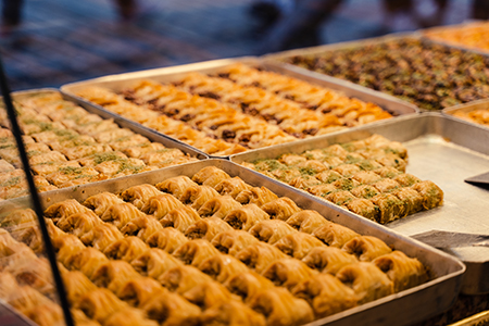 Honey baklava with walnut and pistachio, Turkish market assortment
