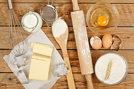 baking preparation, top view of a variety of objects on wooden planks