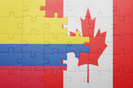 canada and colombia flags puzzle pieces