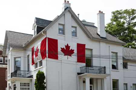 white house with draped canada flag