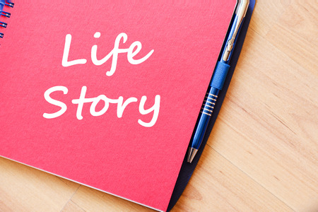 Life story text concept write on notebook with pen