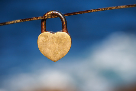 heart shaped lock tied to wire