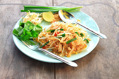 thai chicken dish on white plate