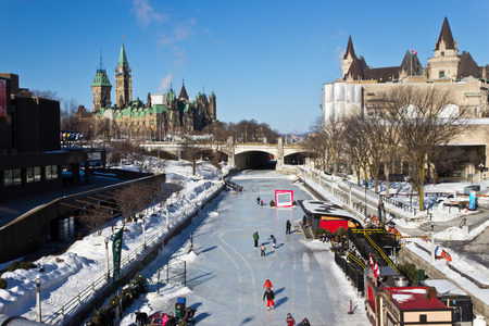 Overlooking skating in ottawa with parliament buildings in back