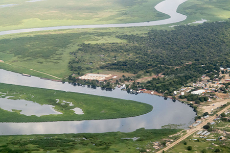 Aerial view of nile river and town in south sudan
