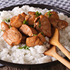 Adobo with rice close-up on a plate