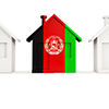 House with flag of afghanistan in a row of white houses. Real estate concept. 3D illustration