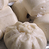 close up of steamed buns