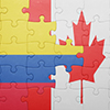 puzzle with the national flag of canada and colombia