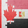 canada and egypt flags as puzzle blended into eachother