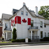 white house with draped canada flag