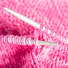 Close up of knitting needles and yarn