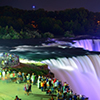 Niagara Falls lit at night by colorful lights (canada)