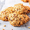 Homemade oatmeal cookies with cranberries, selective focus.