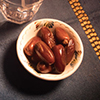 dates, water and holy book on prayer rug