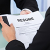 view of resume over the shoulder of interviewer