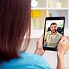 young couple talking online video chat (tablet)