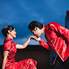Chinese couple in traditional attire posing for wedding photoshoot